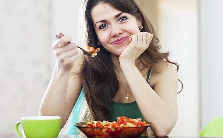 photo-of-woman-holding-spoon-with-food.jpg