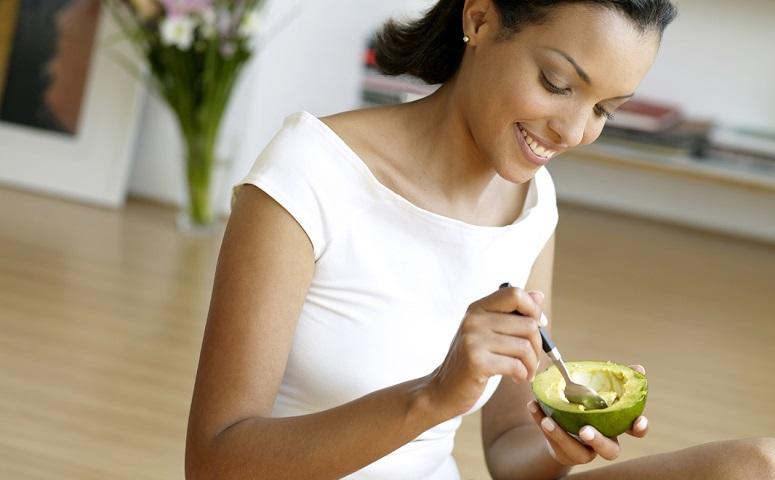 photo-of-woman-holding-avocado.jpg