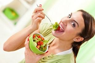 photo-of-a-woman-eating-vegetable-salad.jpg