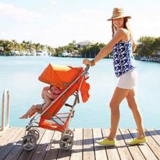 portrait-of-a-woman-pushing-baby-in-stroller.jpg