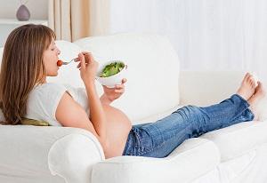 photo-of-pregnant-woman-holding-bowl-of-salad.jpg