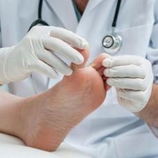 doctor-checking-patient-s-foot.jpg