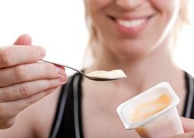 photo-of-woman-holding-yogurt.jpg