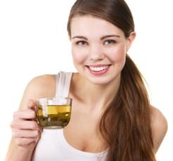 woman-holding-cup-of-green-tea.jpg