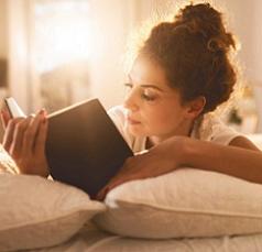 photo-of-woman-reading-book.jpg