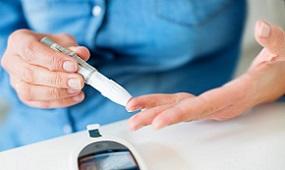 woman-checking-blood-sugar.jpg