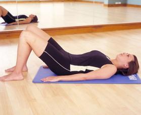 woman-lying-on-floor-with-bend-knees.jpg