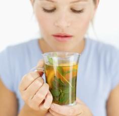 woman-holding-glass-of-tea.jpg