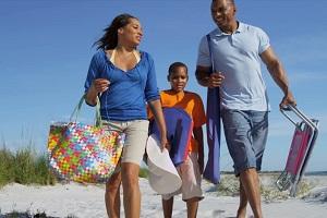 healthy-african-american-parents-young-son-arriving-holiday-together.jpg