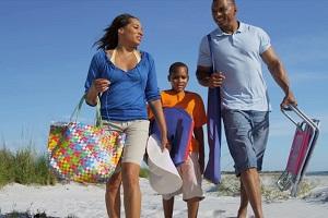 healthy-african-american-parents-young-son-arriving-holiday-together.jpg