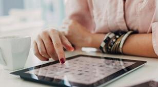 photo-of-a-woman-using-her-gadget-tablet.jpg