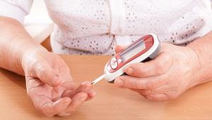 woman-checking-her-blood-sugar.jpg