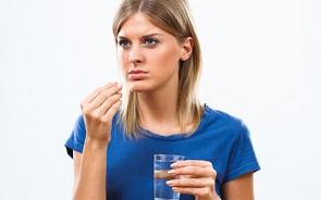 woman-with-supplement-and-water.jpg