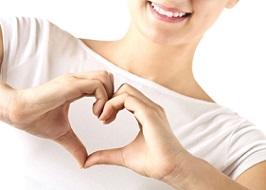 woman-with-sign-of-heart-shape.jpg