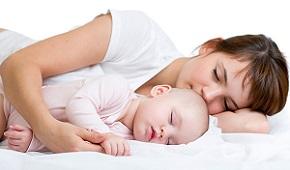 woman-sleeping-with-baby.jpg