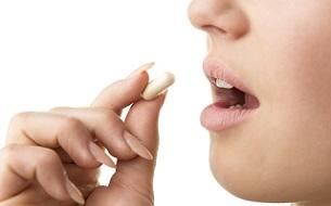 woman-taking-pills.jpg