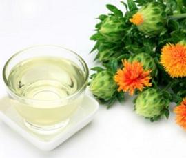 bowl-of-safflower-oil-and-safflower-plant.jpg