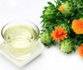 bowl-of-safflower-oil-and-safflower-plant.jpg