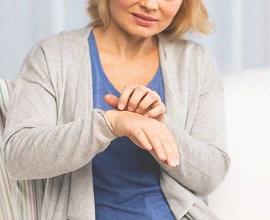 woman-scratching-her-hand.jpg