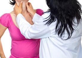 doctor-checking-neck-of-pregnant-woman.jpg
