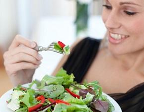 photo-of-a-woman-holding-plate-of-vegetable-salad.jpg