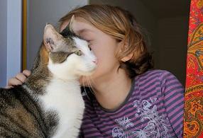photo-of-girl-petting-cat.jpg