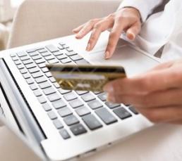 woman-using-laptop-and-holding-credit-card.jpg