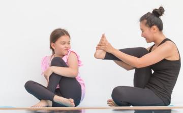mom-and-daughter-do-yoga-together.jpg