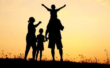 silhouette-happy-children-with-mother-and-father-family-at-sunset-summertime.jpg