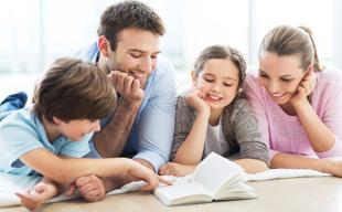 Happy Family Reading Book Together