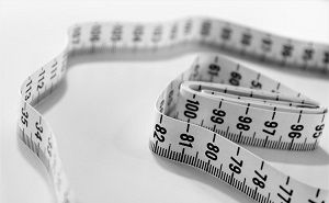 selective focus photography of tape measure