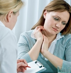 Woman Consulting Doctor