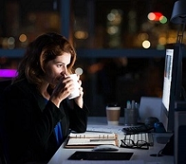 Woman Working at Night in the Office