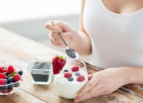 Woman with Glass of Yogurt