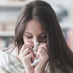 Woman With Keto Flu Covering Her Nose