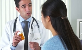 Doctor Explaining New Prescription to Patient