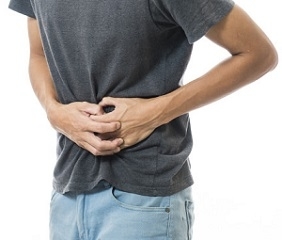 Man suffering from stomach pain