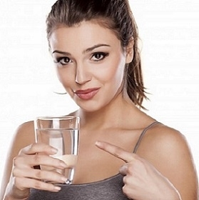 Woman Holding Glass of Water